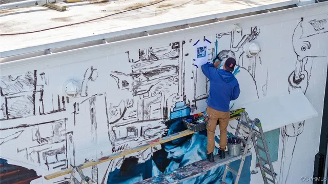 a close up of a white curtain with wooden floor