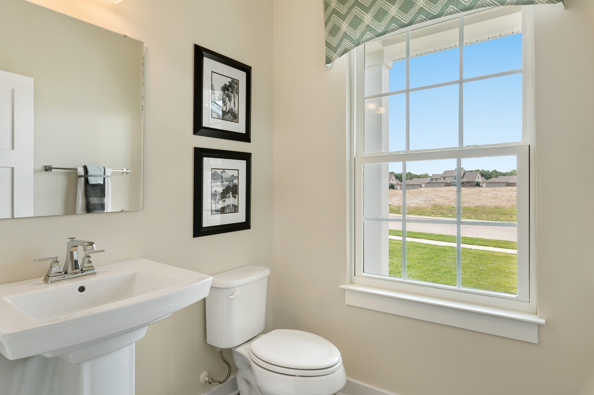 644 Castle Road Mount Juliet, TN 37122 - Photo 8 of 9 a bathroom with a toilet a sink and a window