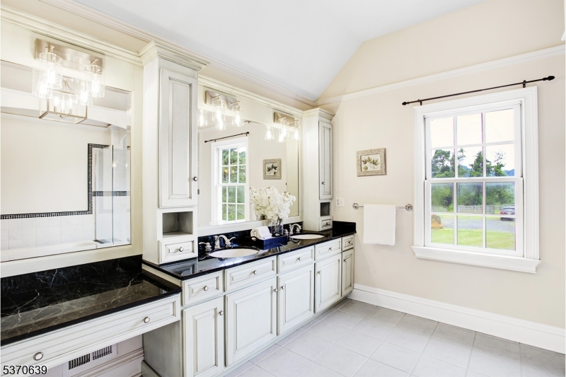 579 Goritz Road Asbury, NJ 08802 - Photo 29 of 50 a kitchen with stainless steel appliances a sink a stove and a window