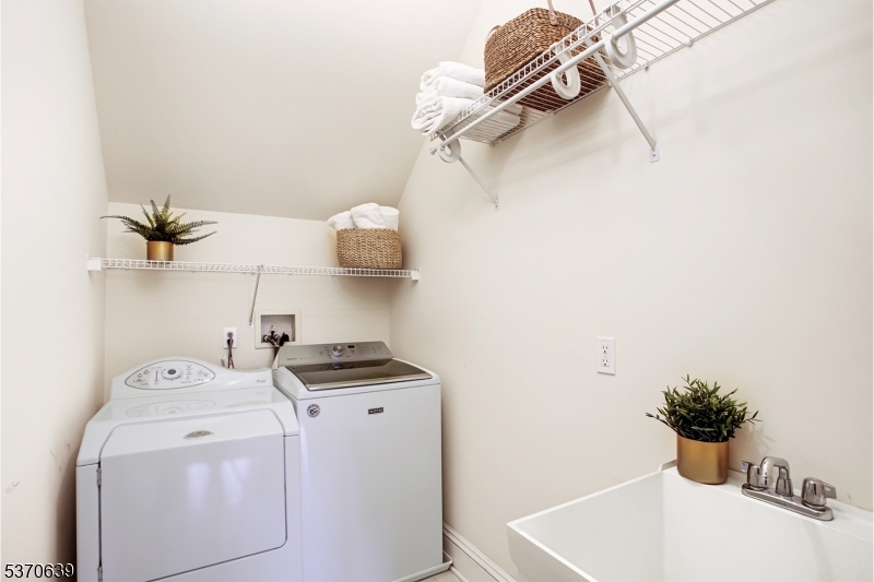 579 Goritz Road Asbury, NJ 08802 - Photo 31 of 50 a view of storage and utility room with washer and dryer