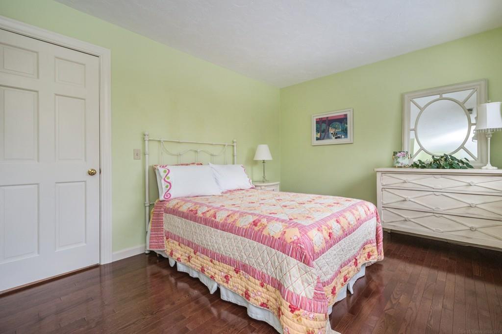 354 Burroughs Road Boxborough, MA 01719 - Photo 29 of 40 a bedroom with a bed and window