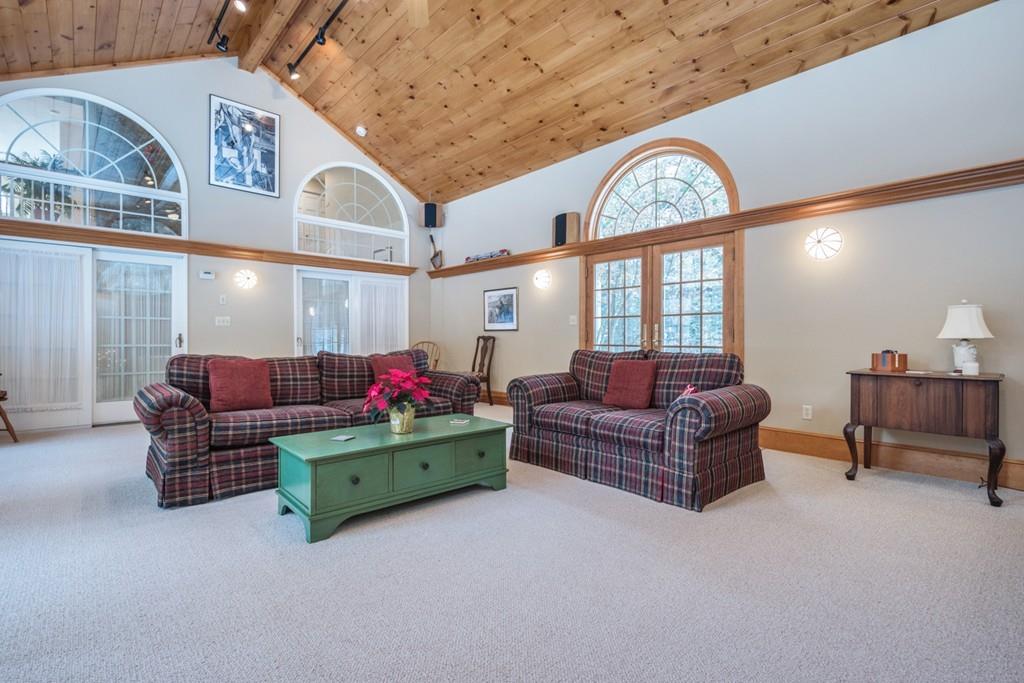 354 Burroughs Road Boxborough, MA 01719 - Photo 9 of 40 a living room with furniture and a large window