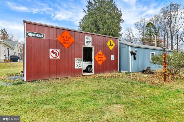 a sign that is in front of a brick building