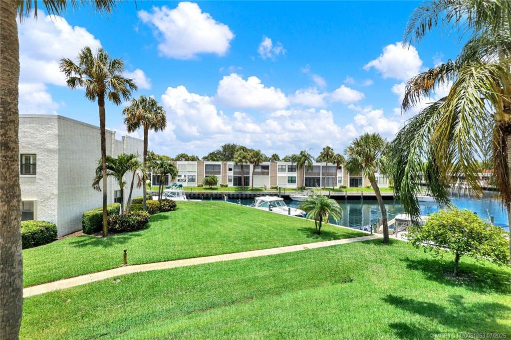 1950 Southwest Palm City Road, Unit 3201 Stuart, FL 34994 - Photo 20 of 51 a view of a park with a house in the background