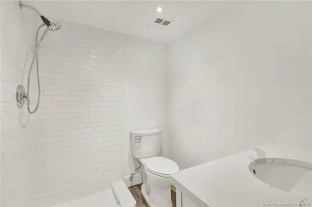 a view of a swimming pool with a house