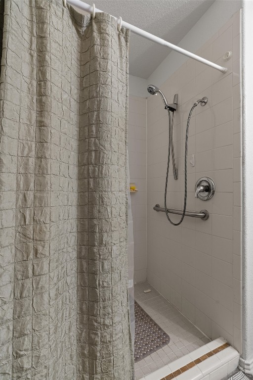 5700 Welsh Way Del Valle, TX 78617 - Photo 17 of 39 a bathroom with a shower