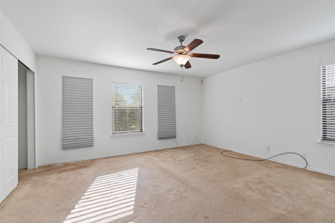 5700 Welsh Way Del Valle, TX 78617 - Photo 29 of 39 a view of an empty room with a window
