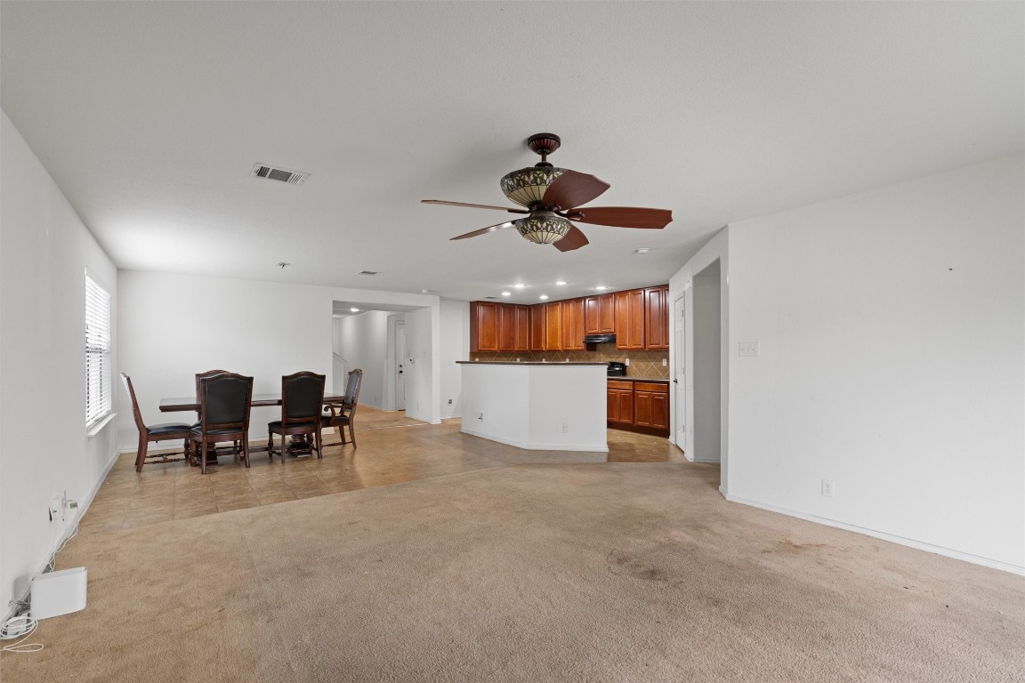 5700 Welsh Way Del Valle, TX 78617 - Photo 7 of 39 a view of livingroom and dining room