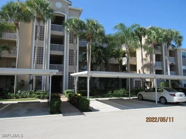 front view of a building with a yard