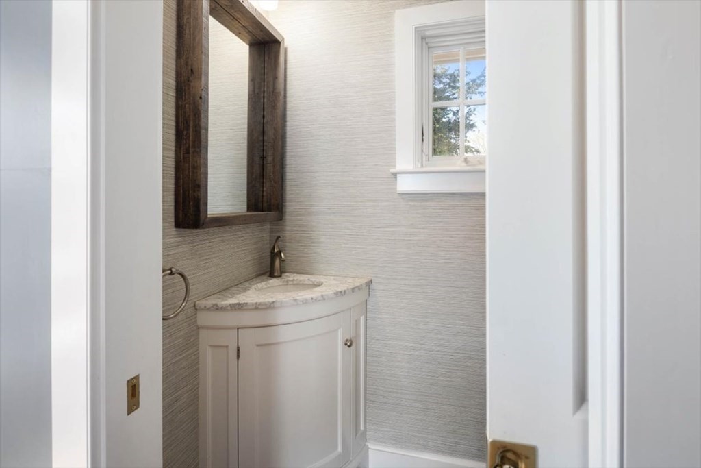 282 King Caesar Road Duxbury, MA 02332 - Photo 13 of 38 a bathroom with a sink and a mirror