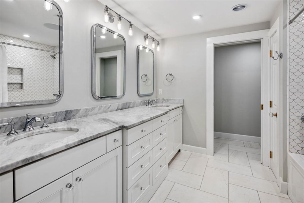 282 King Caesar Road Duxbury, MA 02332 - Photo 22 of 38 a spacious bathroom with a granite countertop sink mirror and double