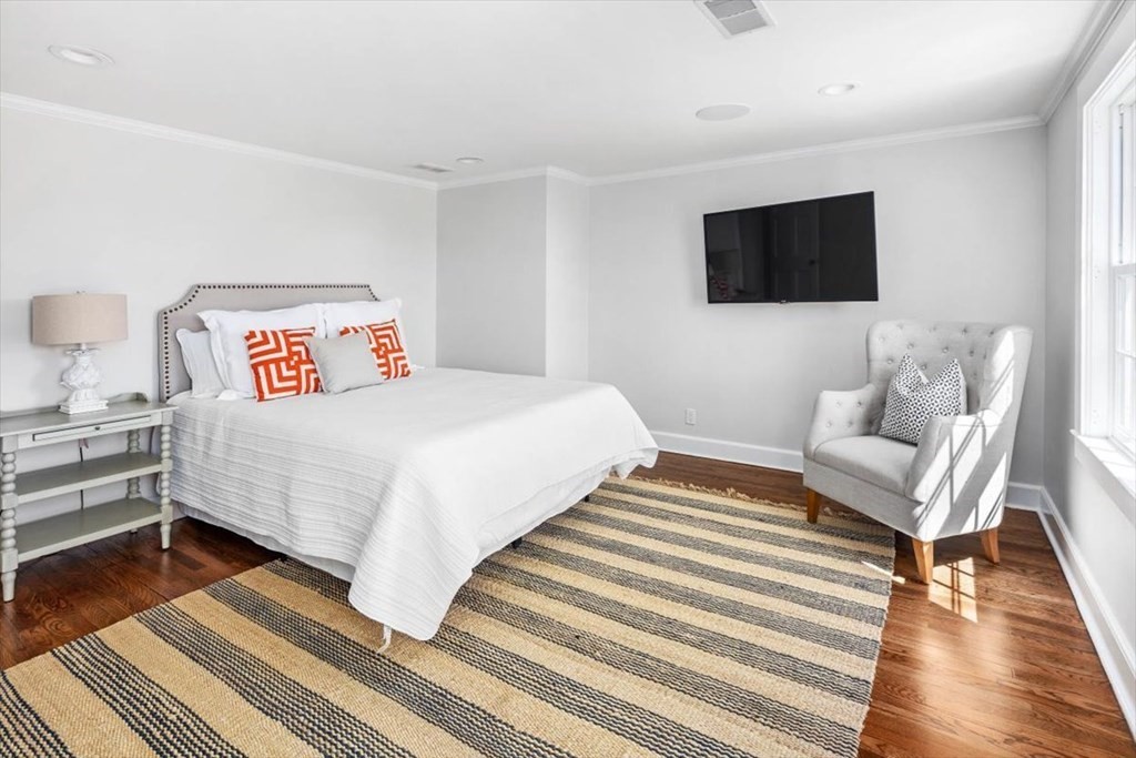 282 King Caesar Road Duxbury, MA 02332 - Photo 26 of 38 a bedroom with a bed and a couch