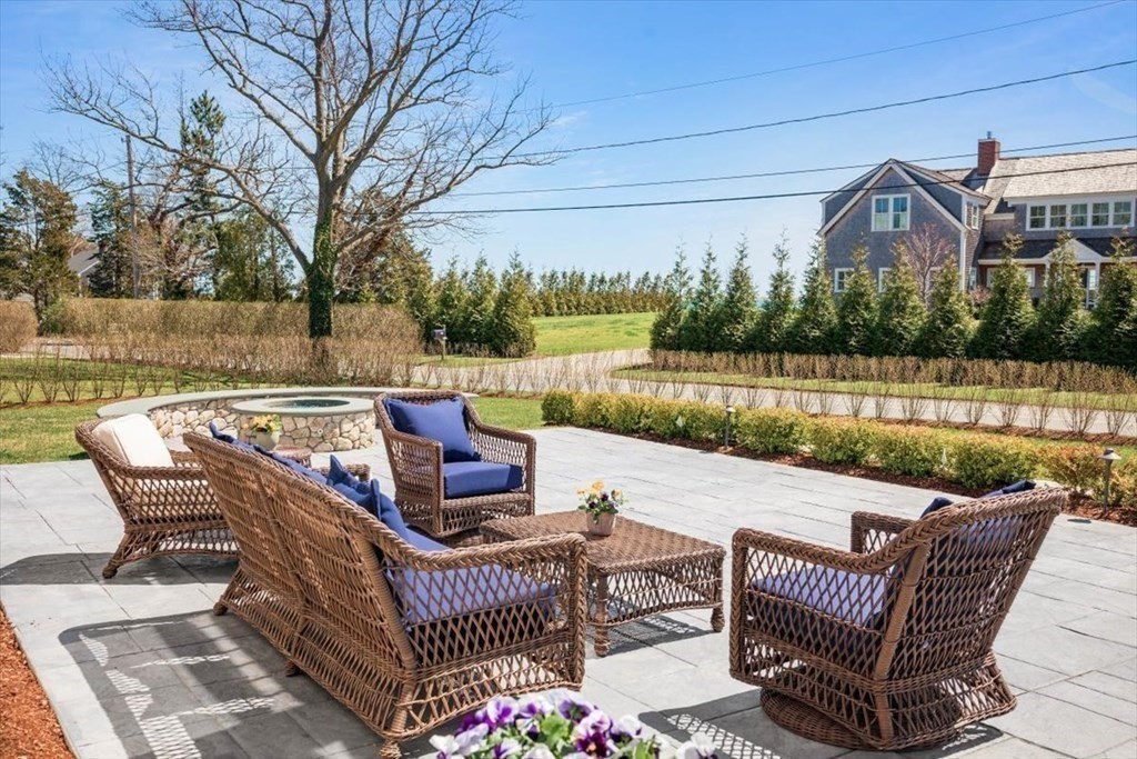 282 King Caesar Road Duxbury, MA 02332 - Photo 33 of 38 a view of a patio with couches chairs and a table and chairs