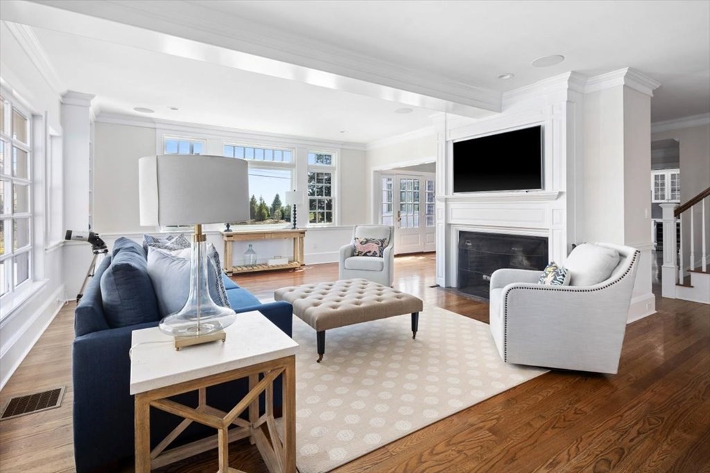 282 King Caesar Road Duxbury, MA 02332 - Photo 6 of 38 a living room with fireplace furniture and a flat screen tv