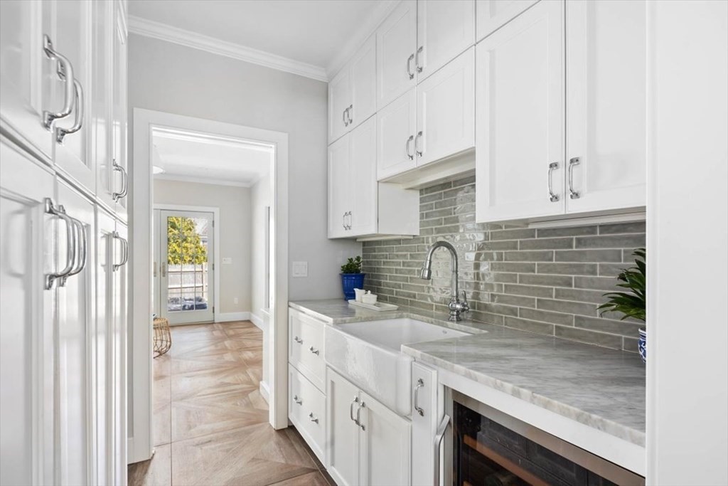 282 King Caesar Road Duxbury, MA 02332 - Photo 9 of 38 a kitchen with stainless steel appliances granite countertop a sink and a stove