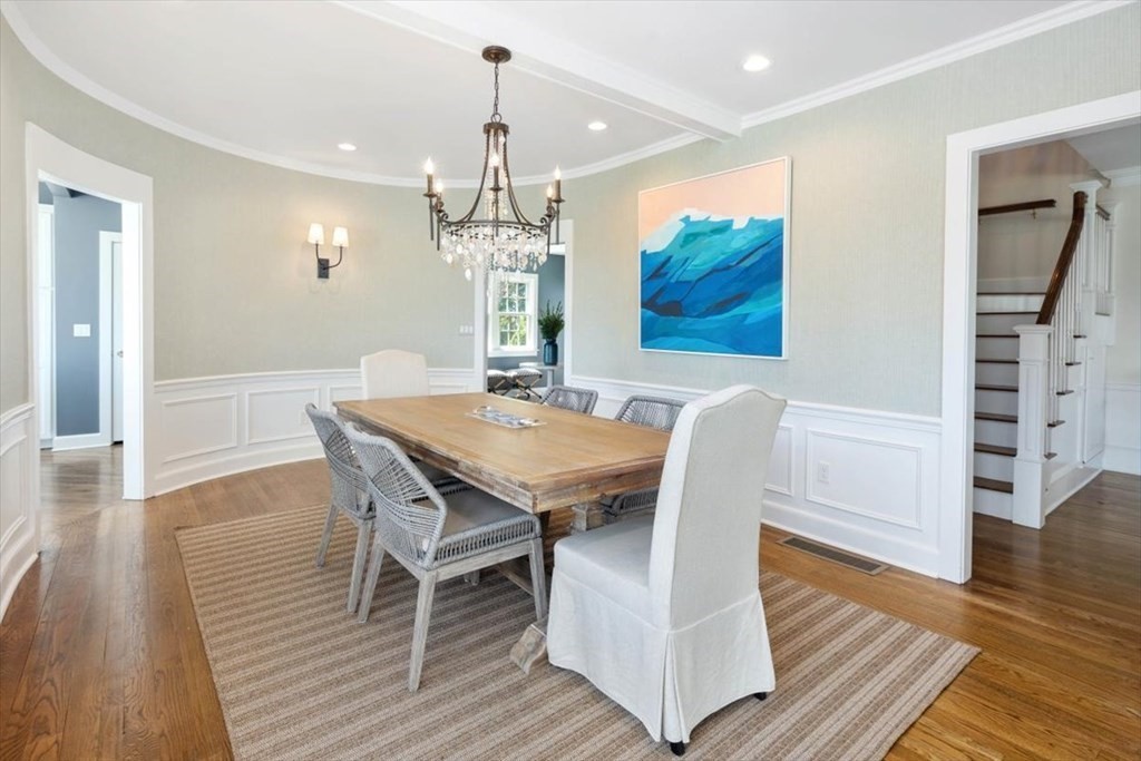 282 King Caesar Road Duxbury, MA 02332 - Photo 10 of 38 a view of a dining room with furniture wooden floor and chandelier
