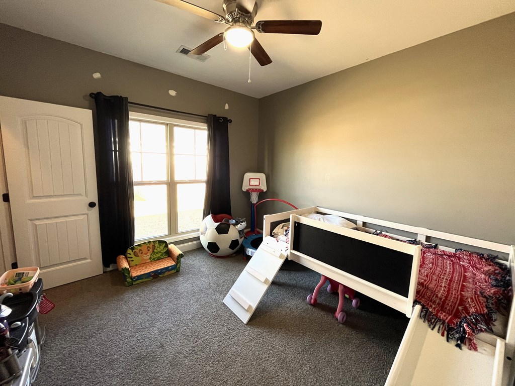 10 Maxwell Drive Fort Mitchell, AL 36856 - Photo 27 of 32 a room with gym equipment and a window