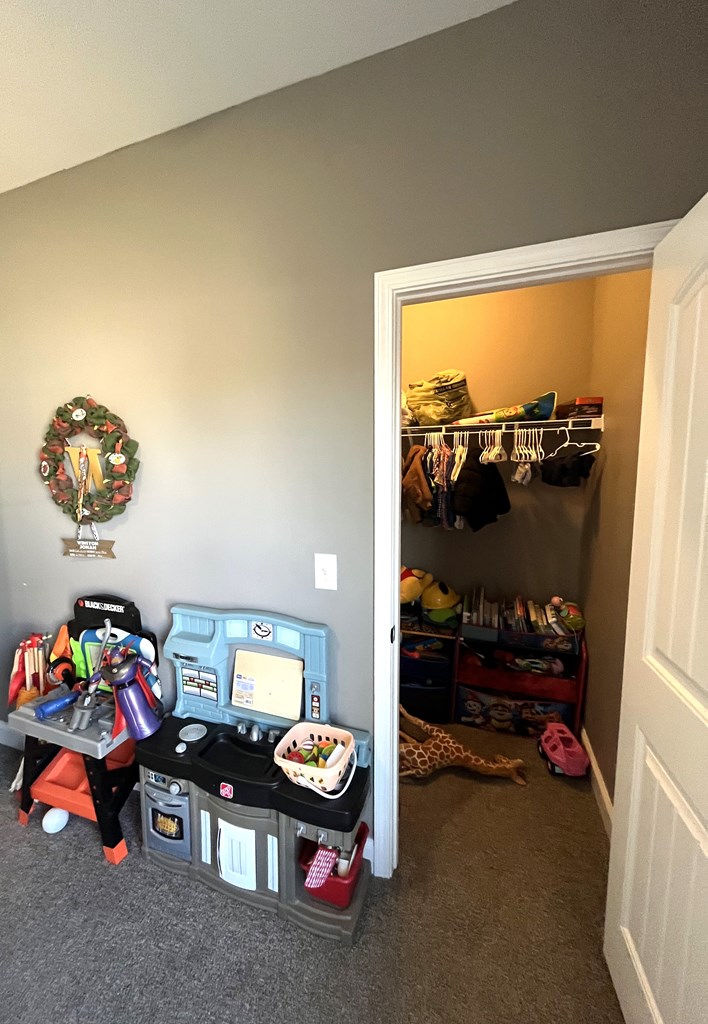 10 Maxwell Drive Fort Mitchell, AL 36856 - Photo 29 of 32 a bedroom with furniture and a window