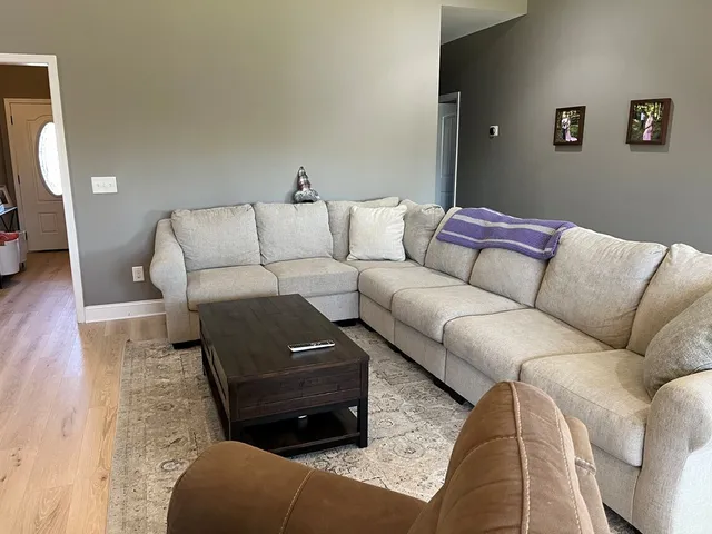 a living room with furniture and a couch