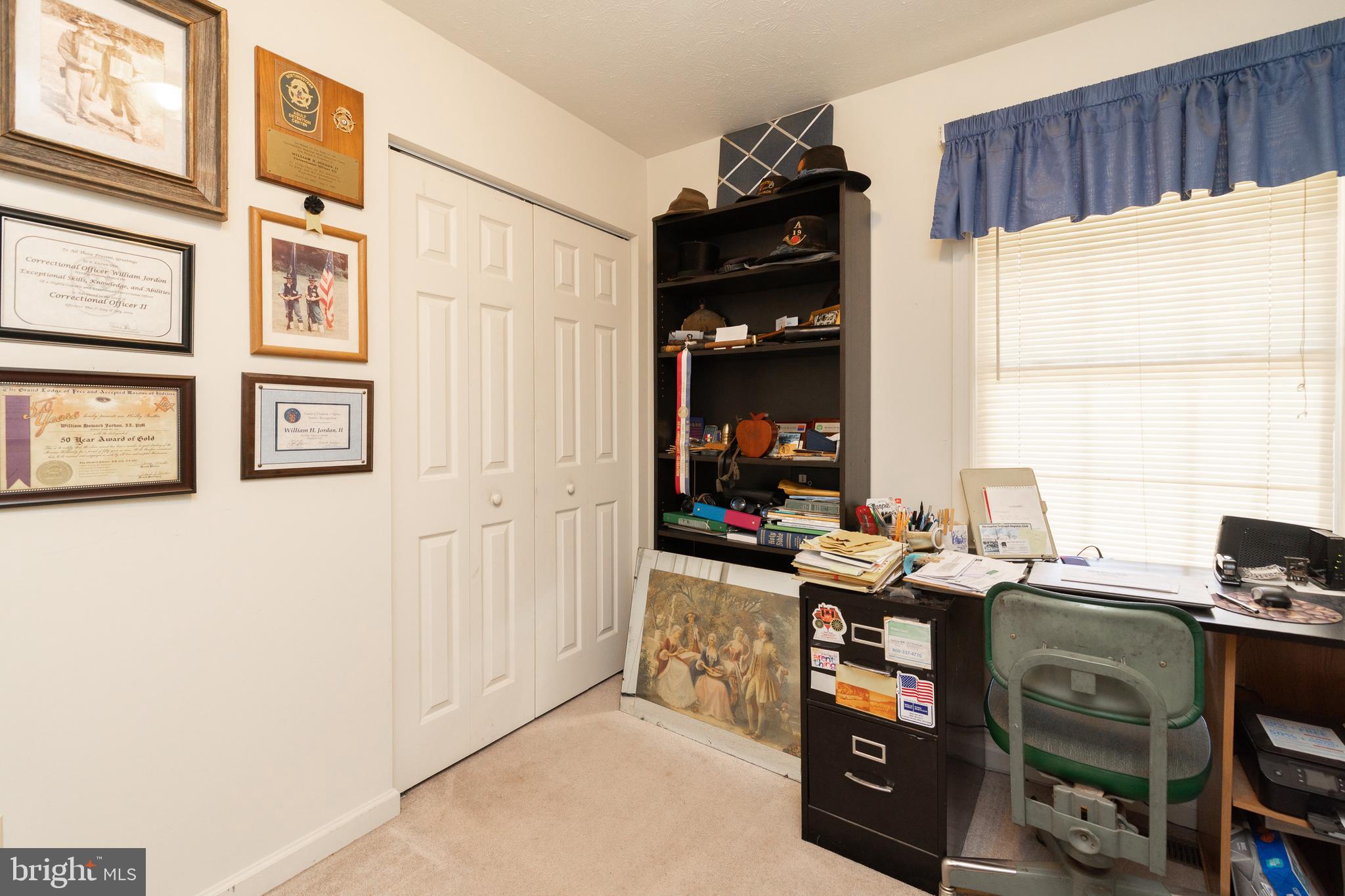 228 Sleepywoods Road Cross Junction, VA 22625 - Photo 12 of 34 a view of a workspace with furniture and a window