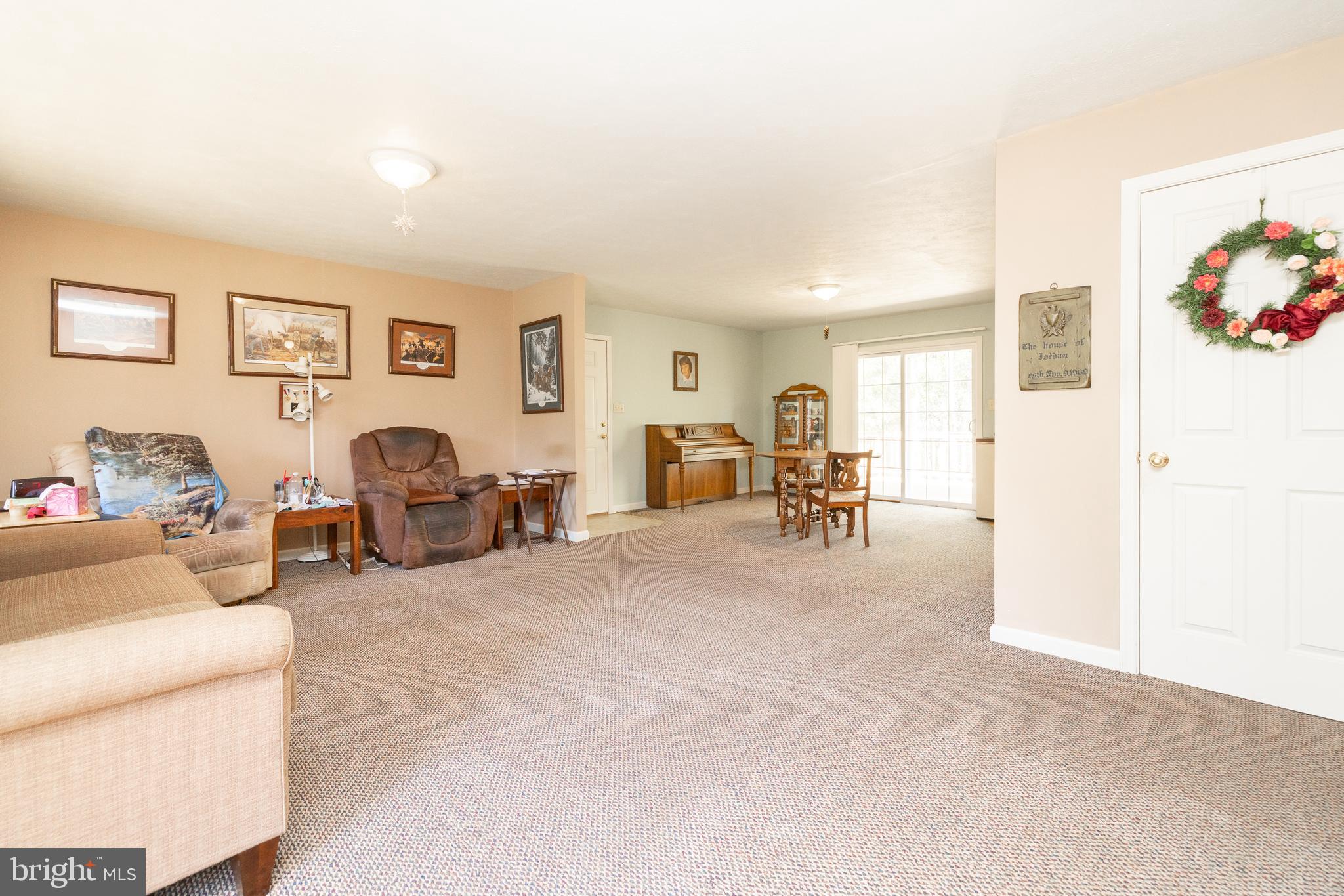 228 Sleepywoods Road Cross Junction, VA 22625 - Photo 3 of 34 a living room with furniture and a flat screen tv
