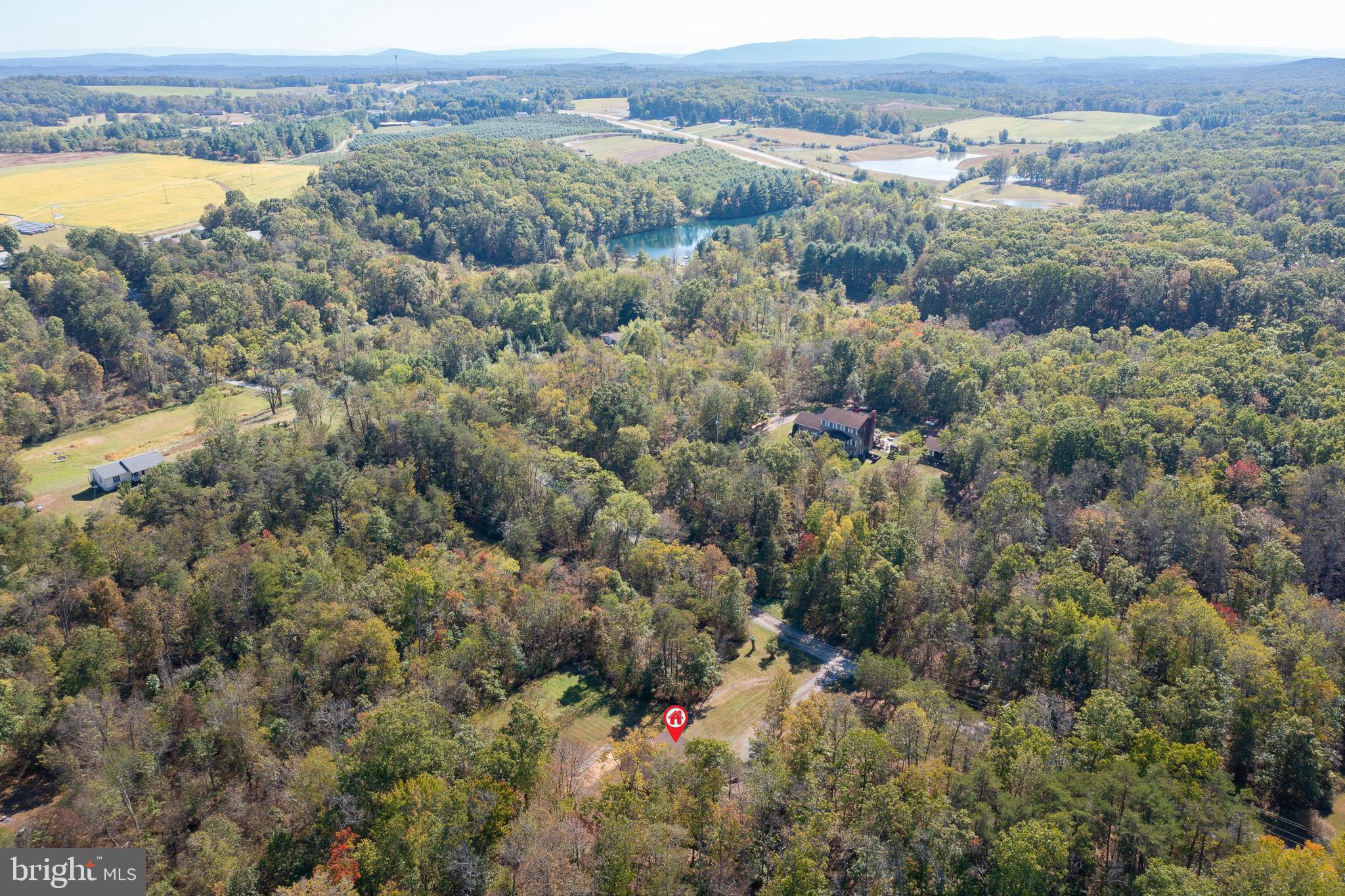 228 Sleepywoods Road Cross Junction, VA 22625 - Photo 34 of 34 an aerial view of a houses with a lush green hillside