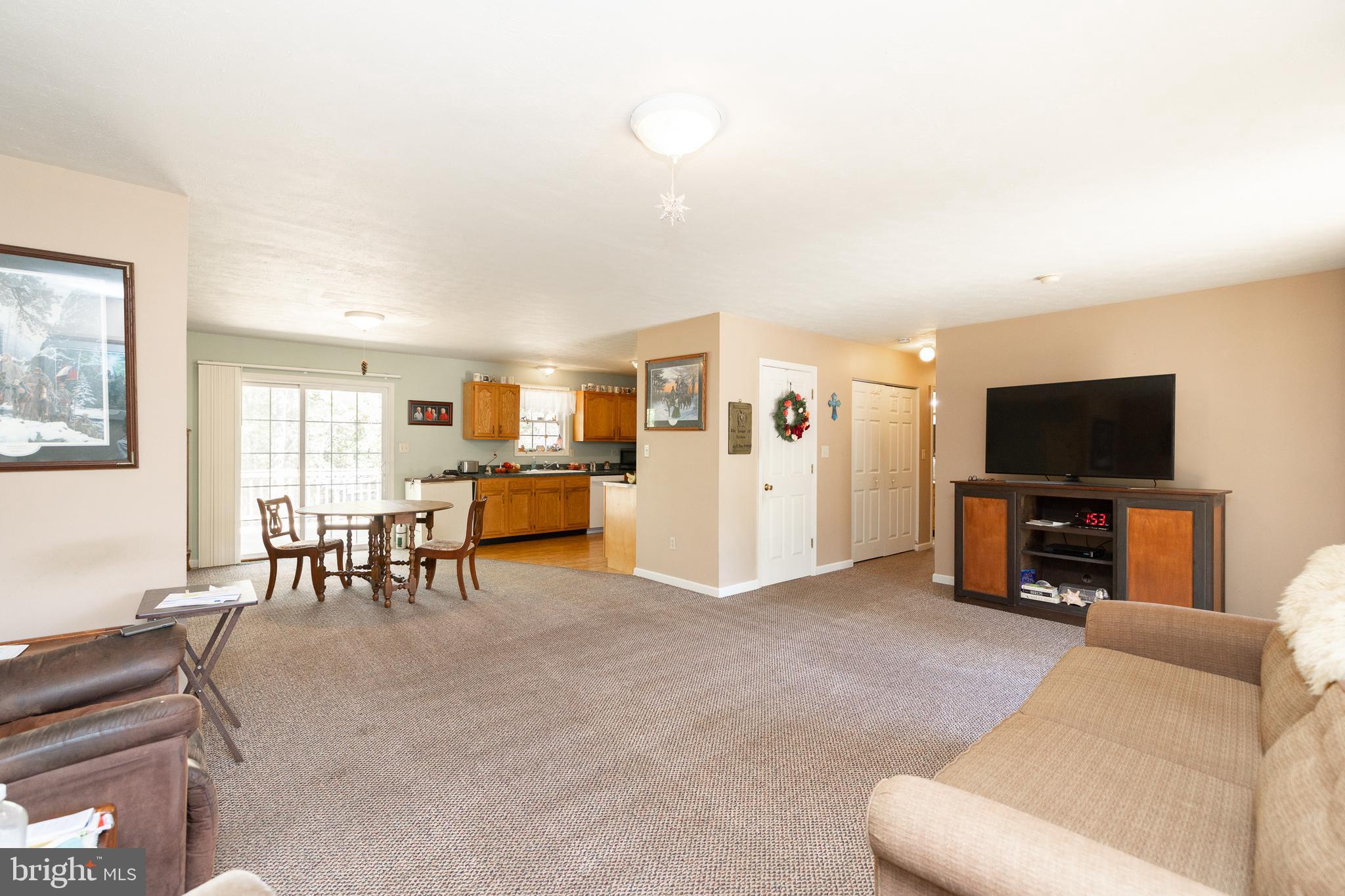228 Sleepywoods Road Cross Junction, VA 22625 - Photo 5 of 34 a living room with furniture and a flat screen tv