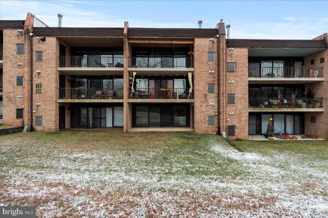 a bathroom with a sink vanity and a mirror