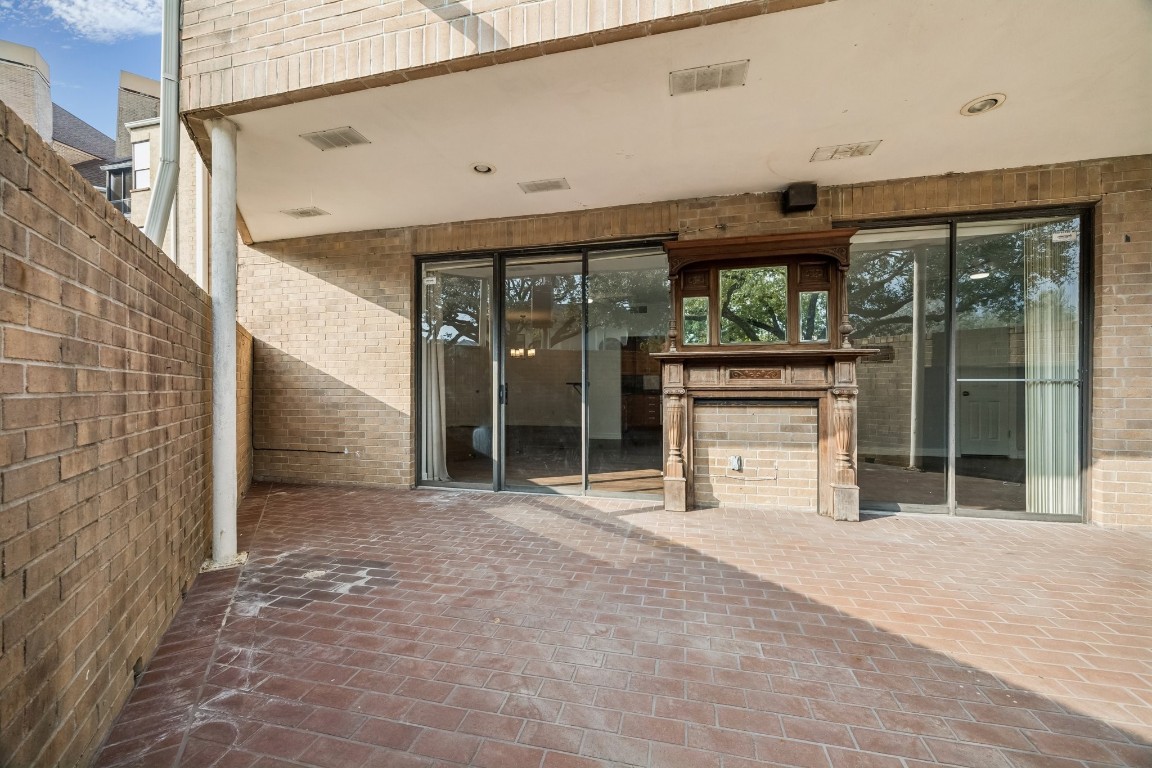 5200 Weslayan Street, Unit 101 Houston, TX 77005 - Photo 16 of 19 a view of a building with a porch