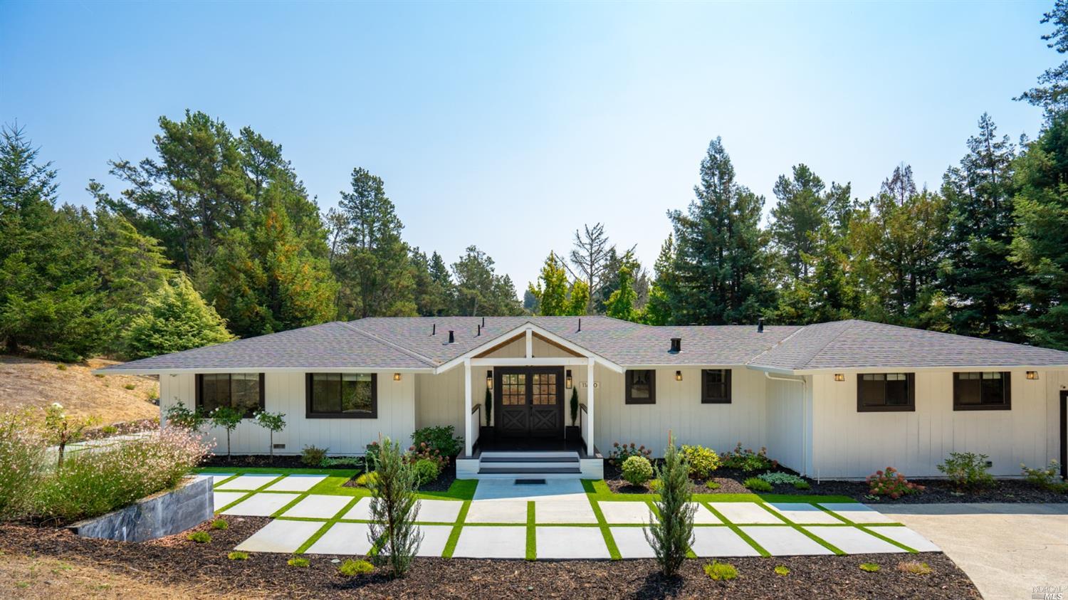 11630 Barnett Valley Road Sebastopol, CA 95472 - Photo 1 of 1 a house with green field in front of it