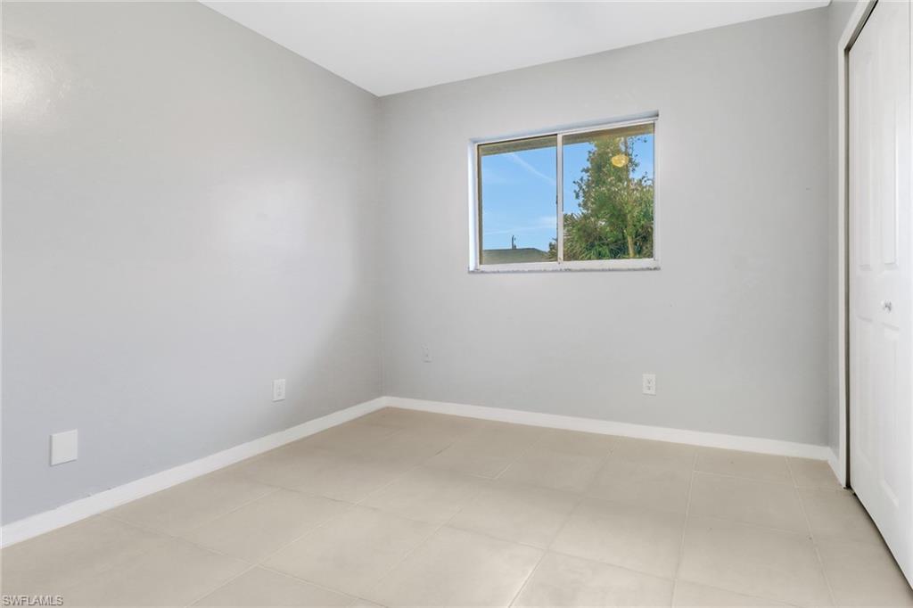 220 Ancona Street Fort Myers, FL 33913 - Photo 19 of 25 an empty room with a window