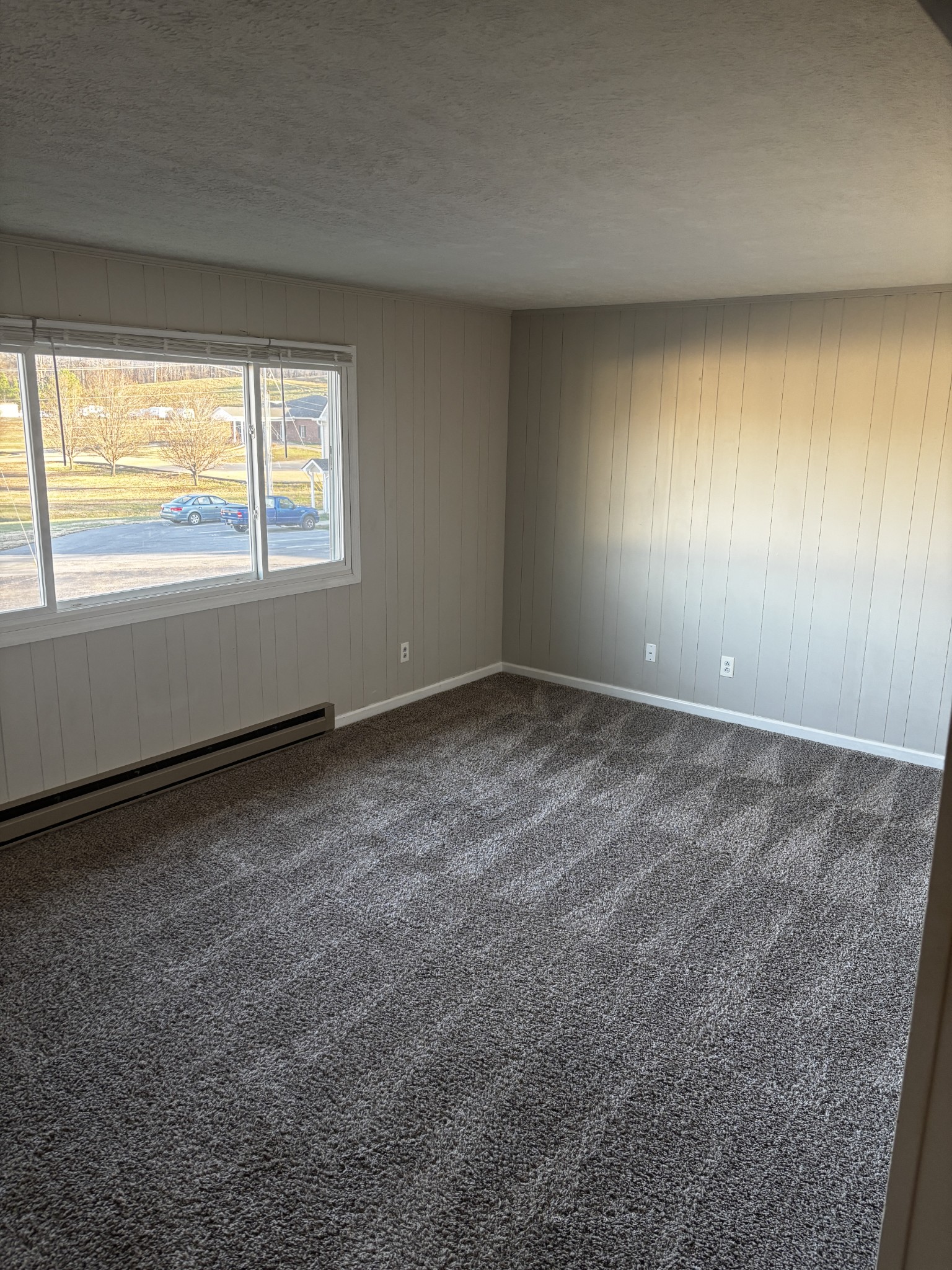 1326 Spring Street, Unit 10 Dover, TN 37058 - Photo 6 of 9 an empty room with a window