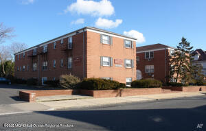 151 Stockton Avenue, Unit 7 Ocean Grove, NJ 07756 - Photo 1 of 5 a street view along with residential houses