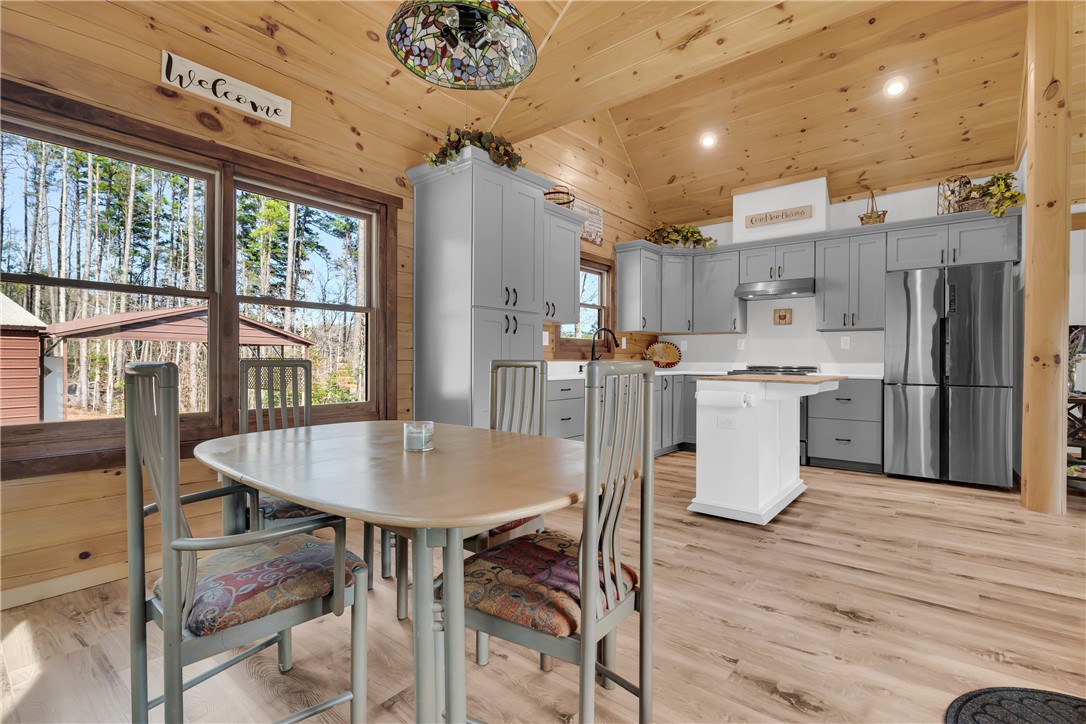 239 North Little River Road Salem, SC 29676 - Photo 13 of 43 This spacious kitchen with natural light and a dining area is ideal for entertaining.