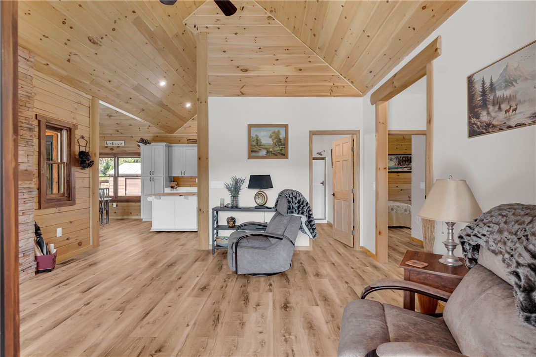239 North Little River Road Salem, SC 29676 - Photo 23 of 43 This inviting interior features elegant vaulted ceilings and beautiful hardwood flooring.