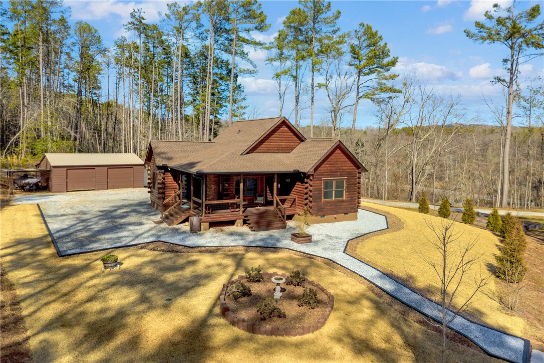 239 North Little River Road Salem, SC 29676 - Photo 4 of 43 This inviting log home features a classic design with natural surroundings.