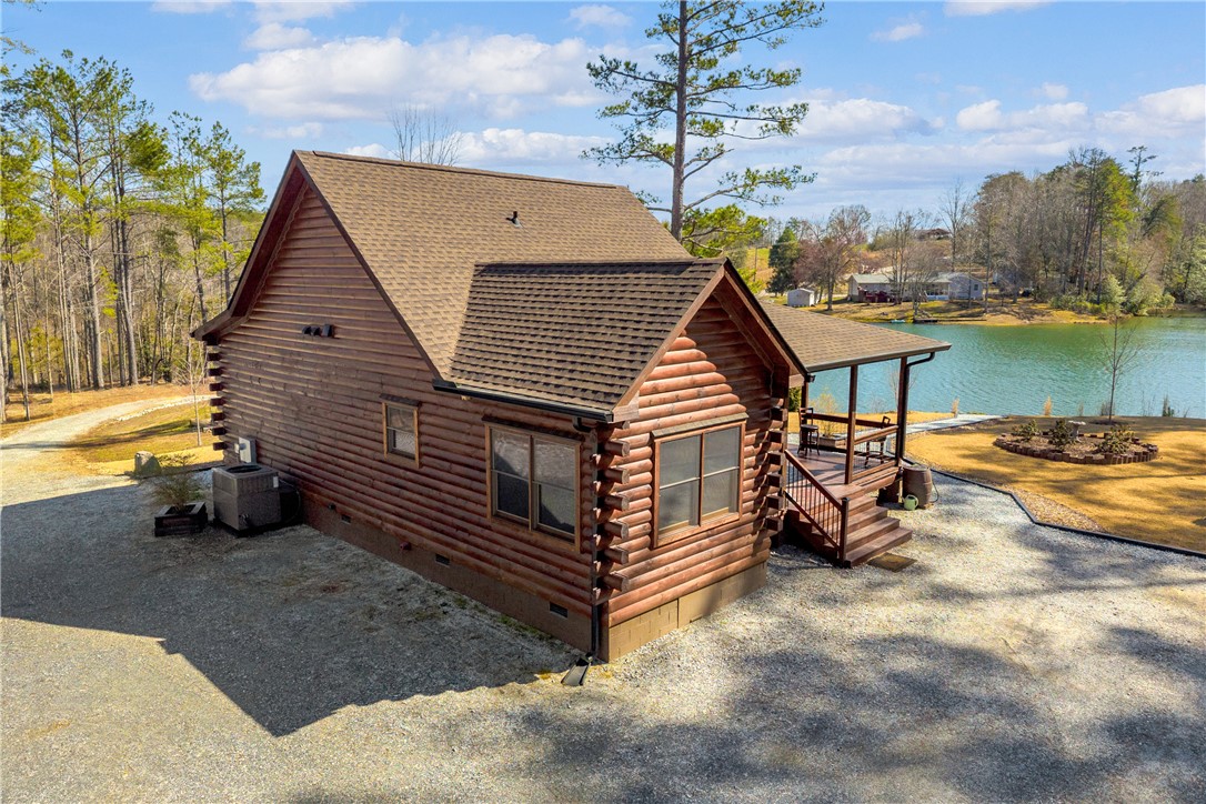 239 North Little River Road Salem, SC 29676 - Photo 8 of 43 This charming cabin offers serene lake views and a tranquil retreat amidst nature's beauty.