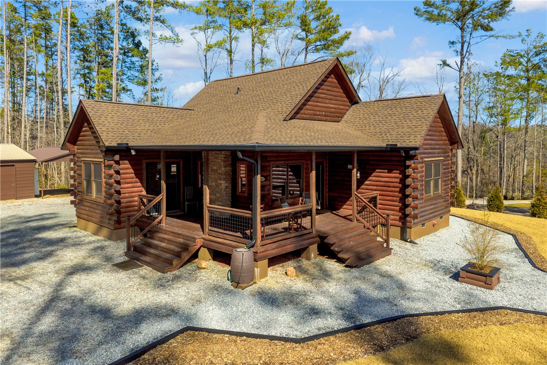 239 North Little River Road Salem, SC 29676 - Photo 9 of 43 This charming cabin offers a rustic retreat with spacious outdoor living areas.