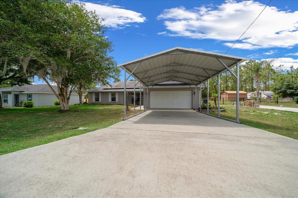 234 Locust Lane Ocala, FL 34472 - Photo 15 of 71 a view of a house with a yard