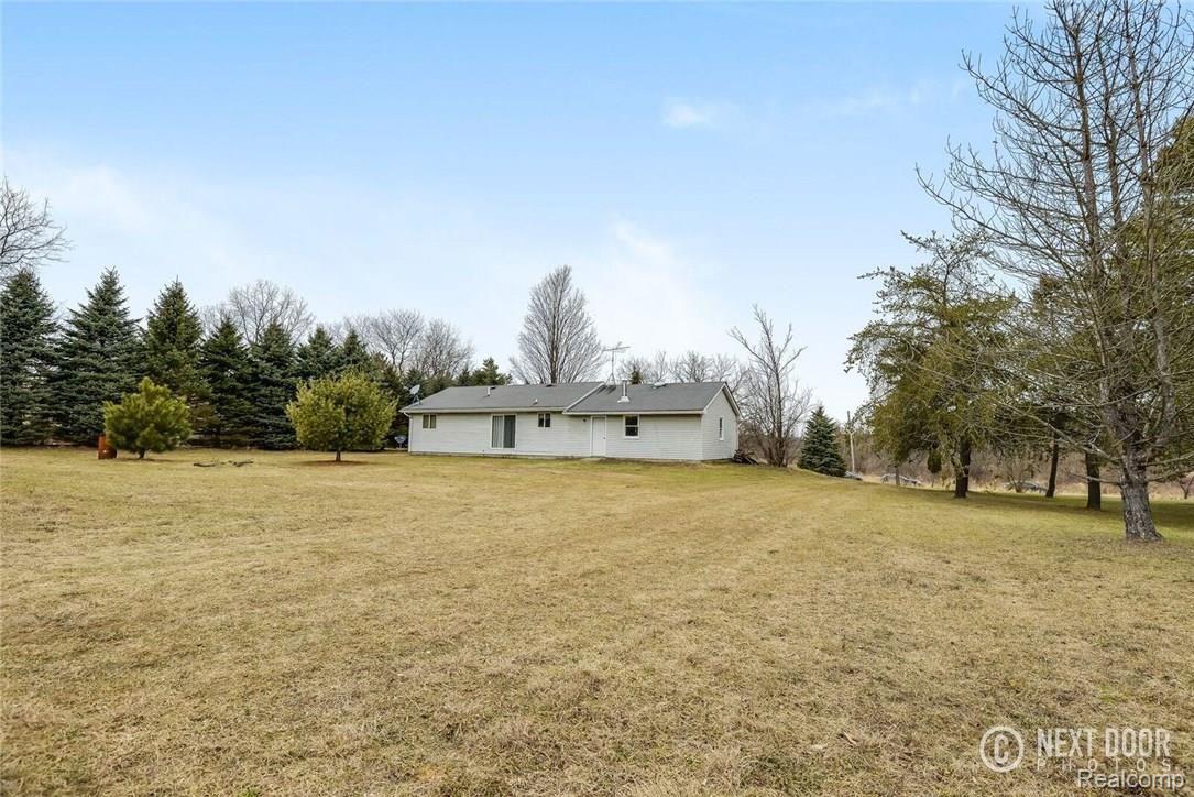 3611 Steinacker Road Howell, MI 48855 - Photo 16 of 20 Rear of Home and Yard