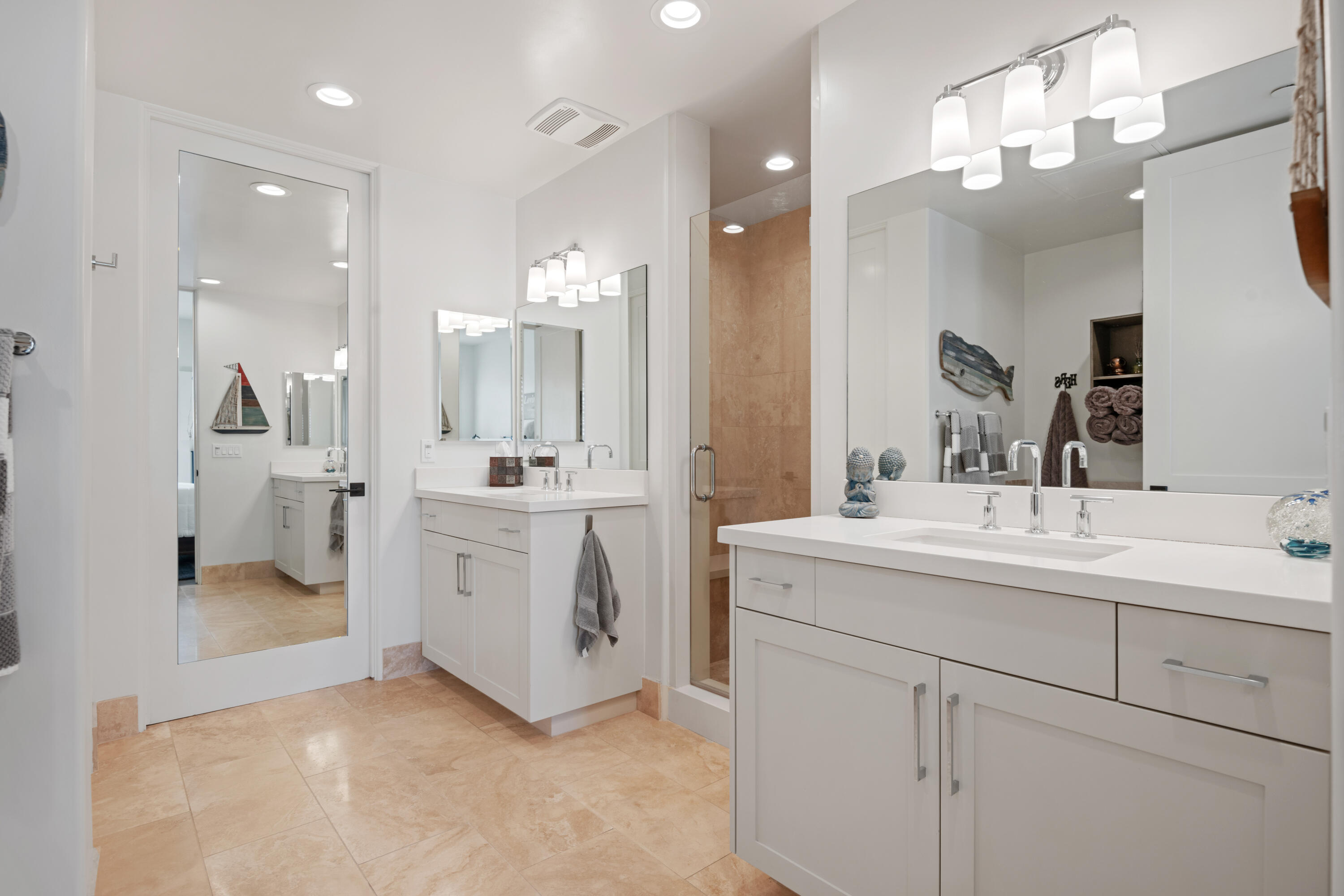 3726 State Street, Unit 203 Santa Barbara, CA 93105 - Photo 18 of 30 a bathroom with a sink a mirror and a shower
