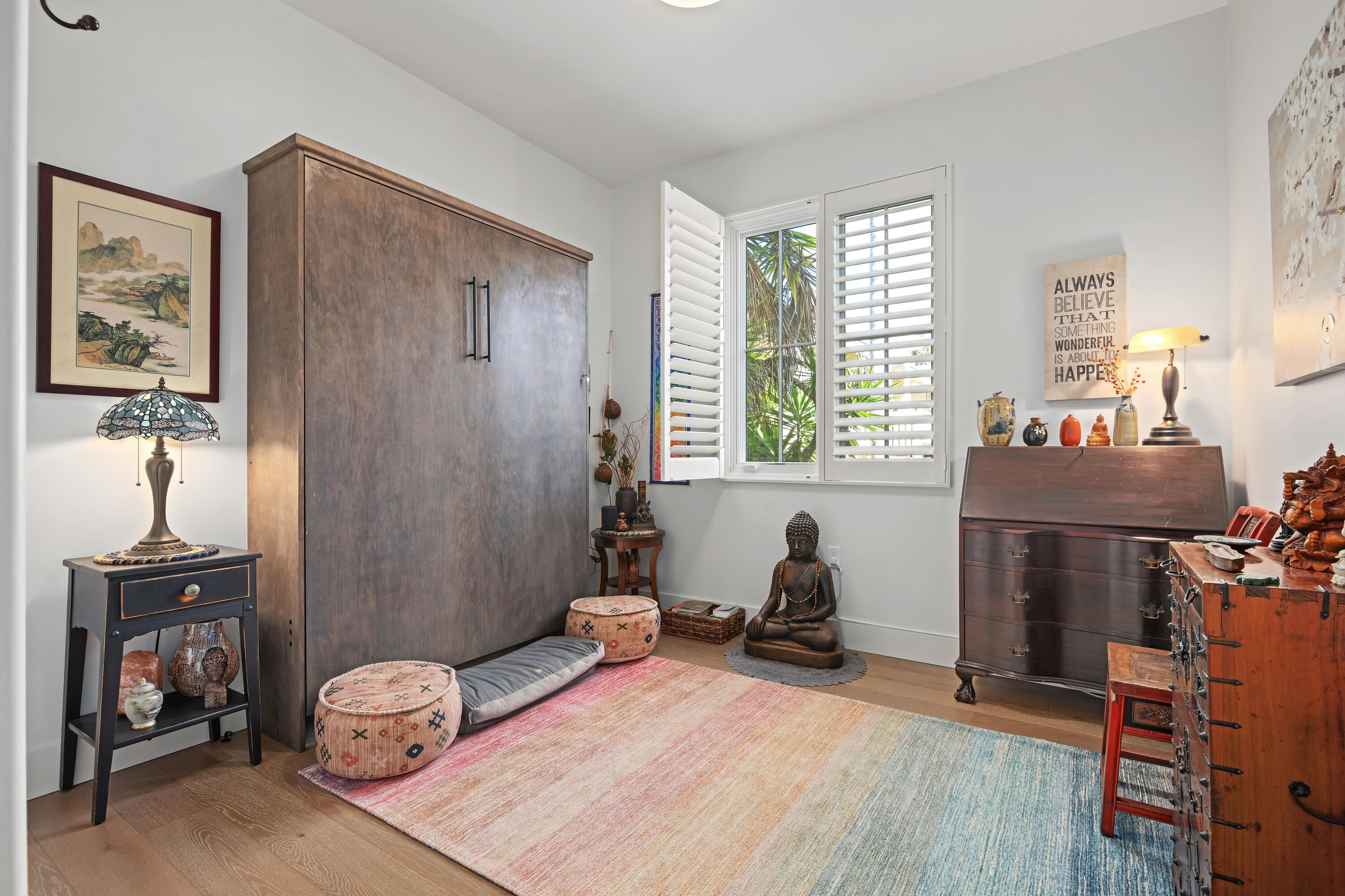 3726 State Street, Unit 203 Santa Barbara, CA 93105 - Photo 20 of 30 a bedroom with a bed and wooden floor