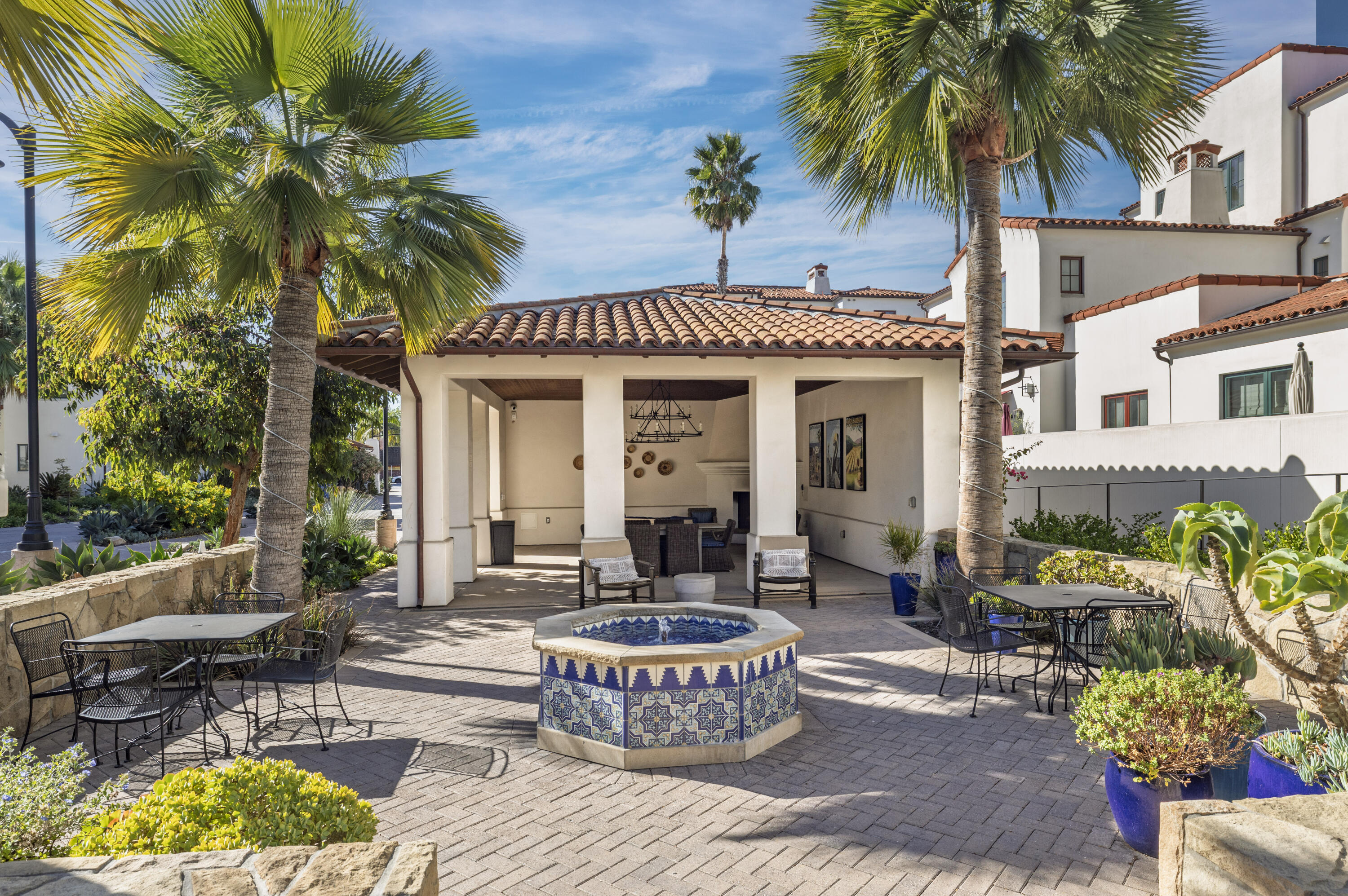 3726 State Street, Unit 203 Santa Barbara, CA 93105 - Photo 25 of 30 a front view of a house with swimming pool and furniture