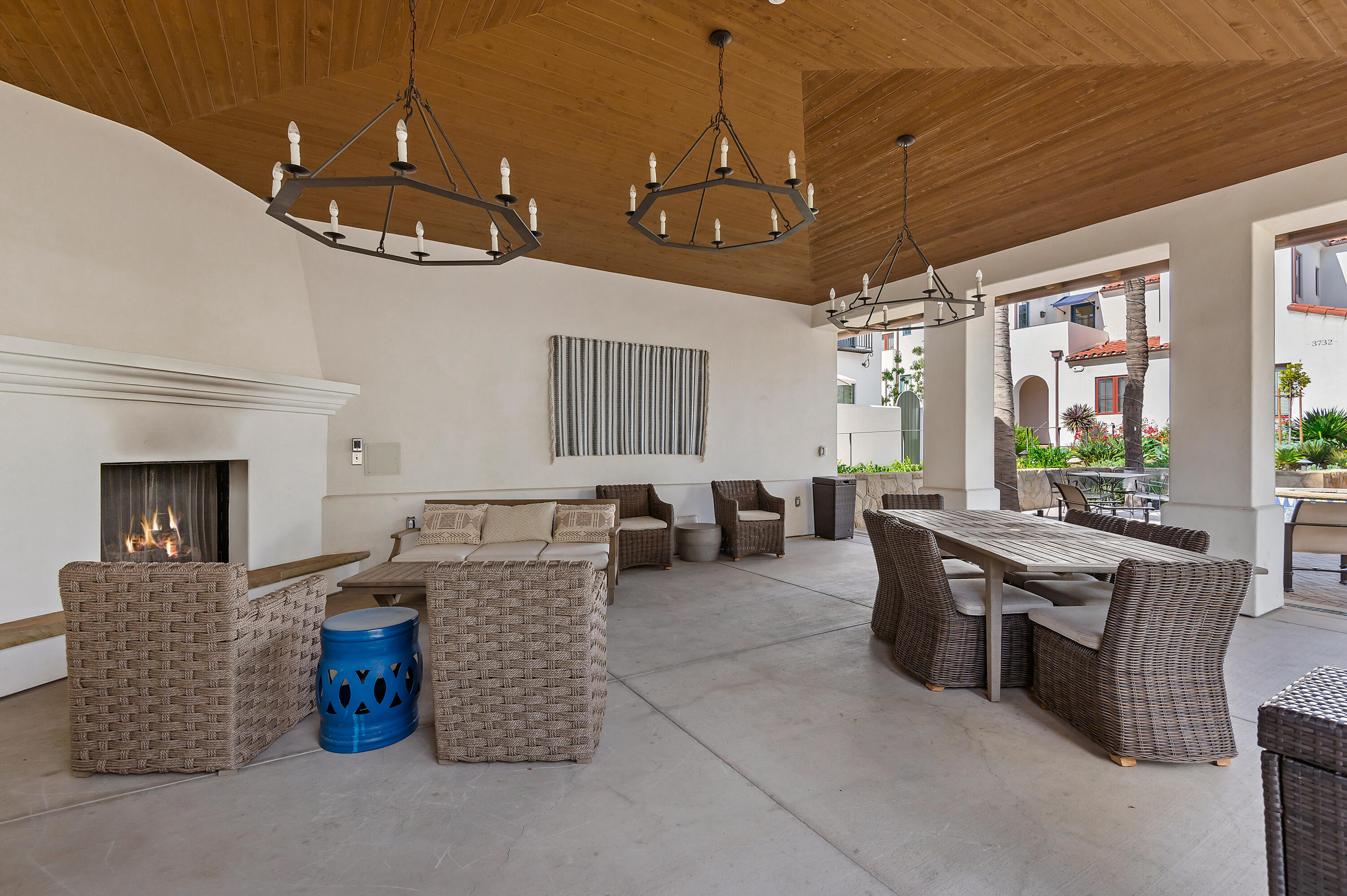 3726 State Street, Unit 203 Santa Barbara, CA 93105 - Photo 27 of 30 a living room with furniture and a chandelier