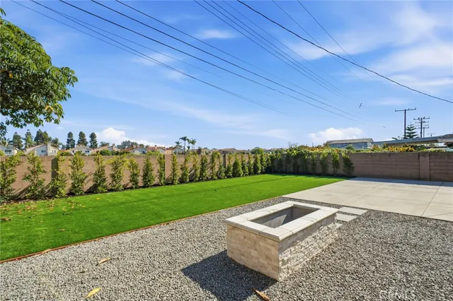 a view of a backyard with an outdoor space