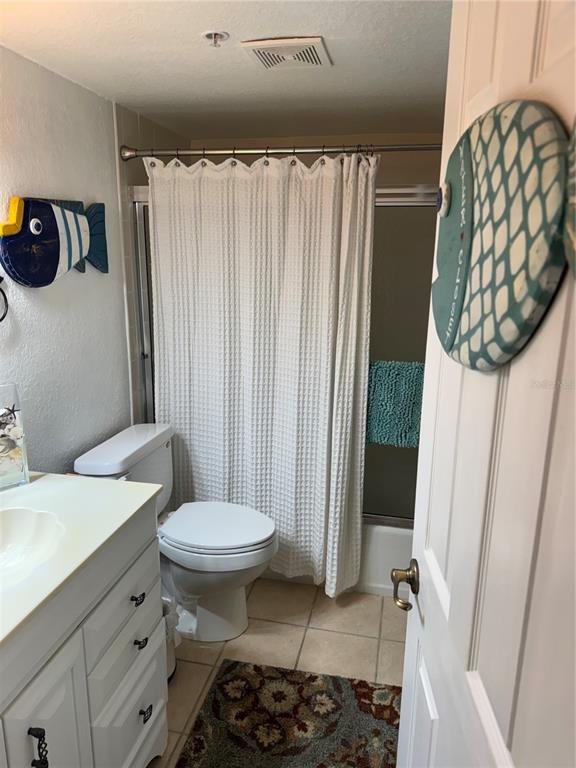 23465 Harbor View Road, Unit 244 Punta Gorda, FL 33980 - Photo 17 of 61 a bathroom with a sink and a mirror