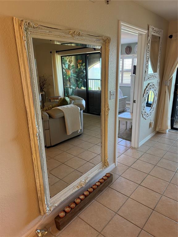 23465 Harbor View Road, Unit 244 Punta Gorda, FL 33980 - Photo 29 of 61 view of living room with furniture and window