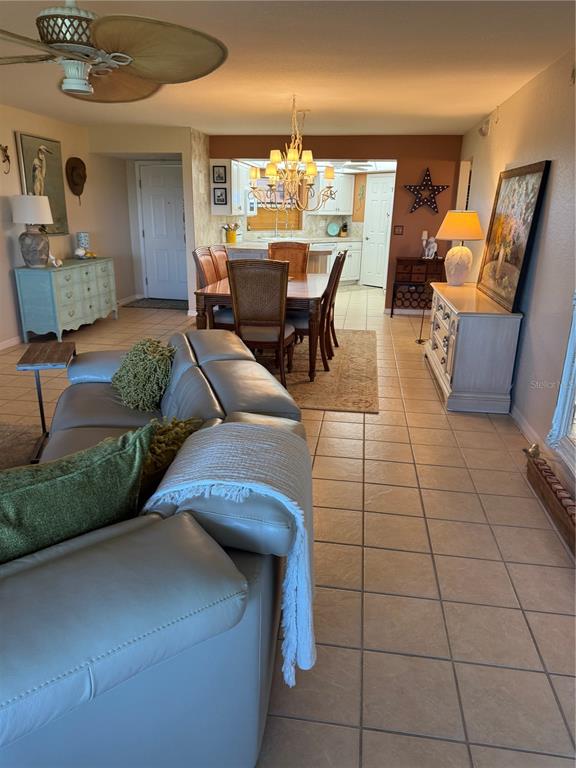 23465 Harbor View Road, Unit 244 Punta Gorda, FL 33980 - Photo 42 of 61 a living room with furniture and a dining table