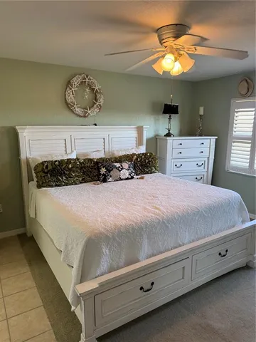 a view of bedroom with furniture and cabinet