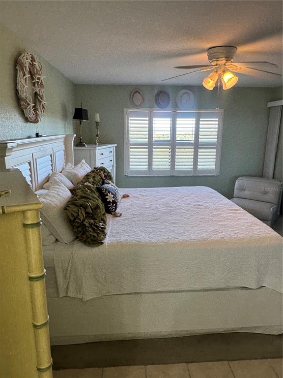 23465 Harbor View Road, Unit 244 Punta Gorda, FL 33980 - Photo 60 of 61 a bedroom with a bed and window